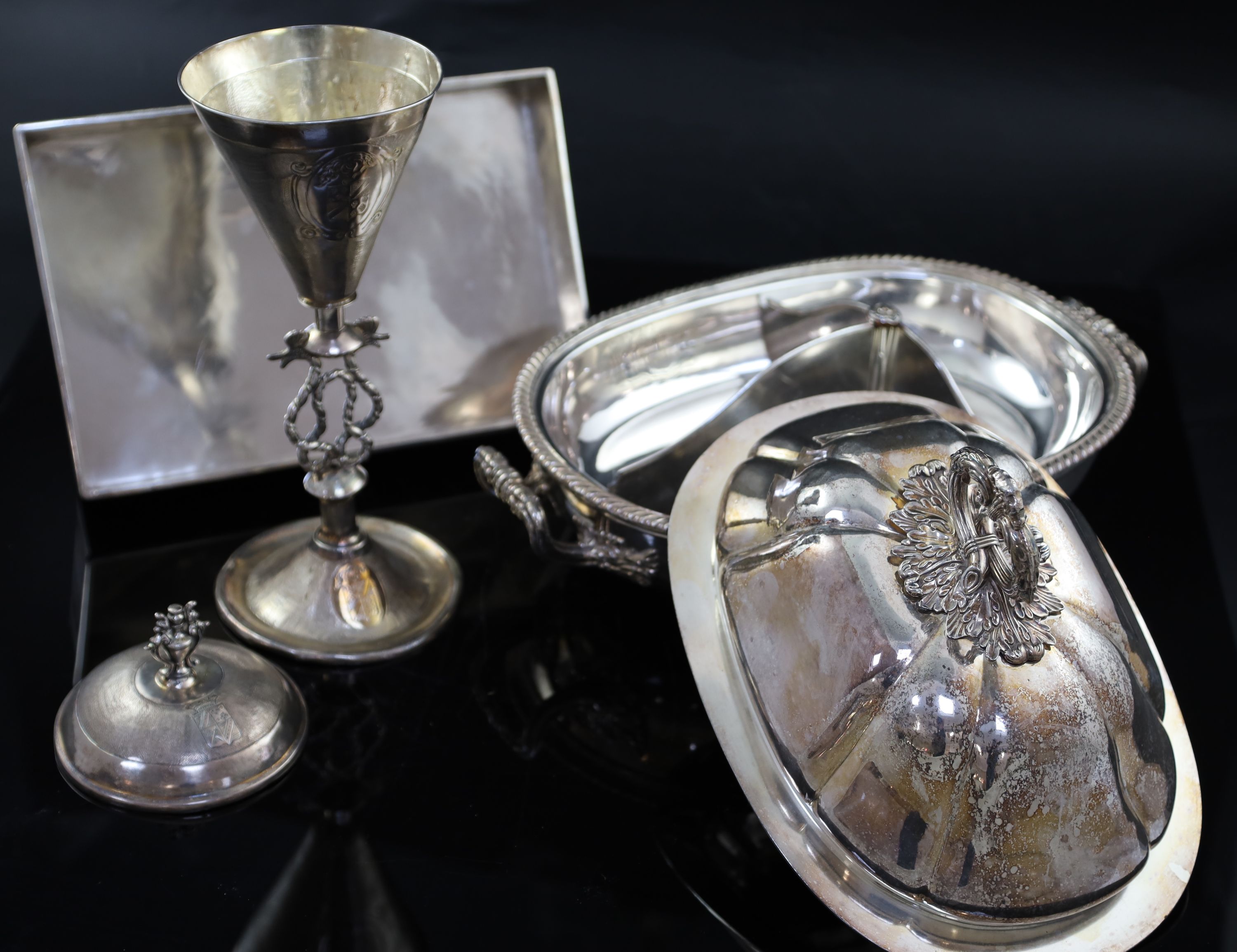 A Continental white metal cup and cover, 35.5cm, 14.5 oz, a silver plated tureen and a rectangular dish